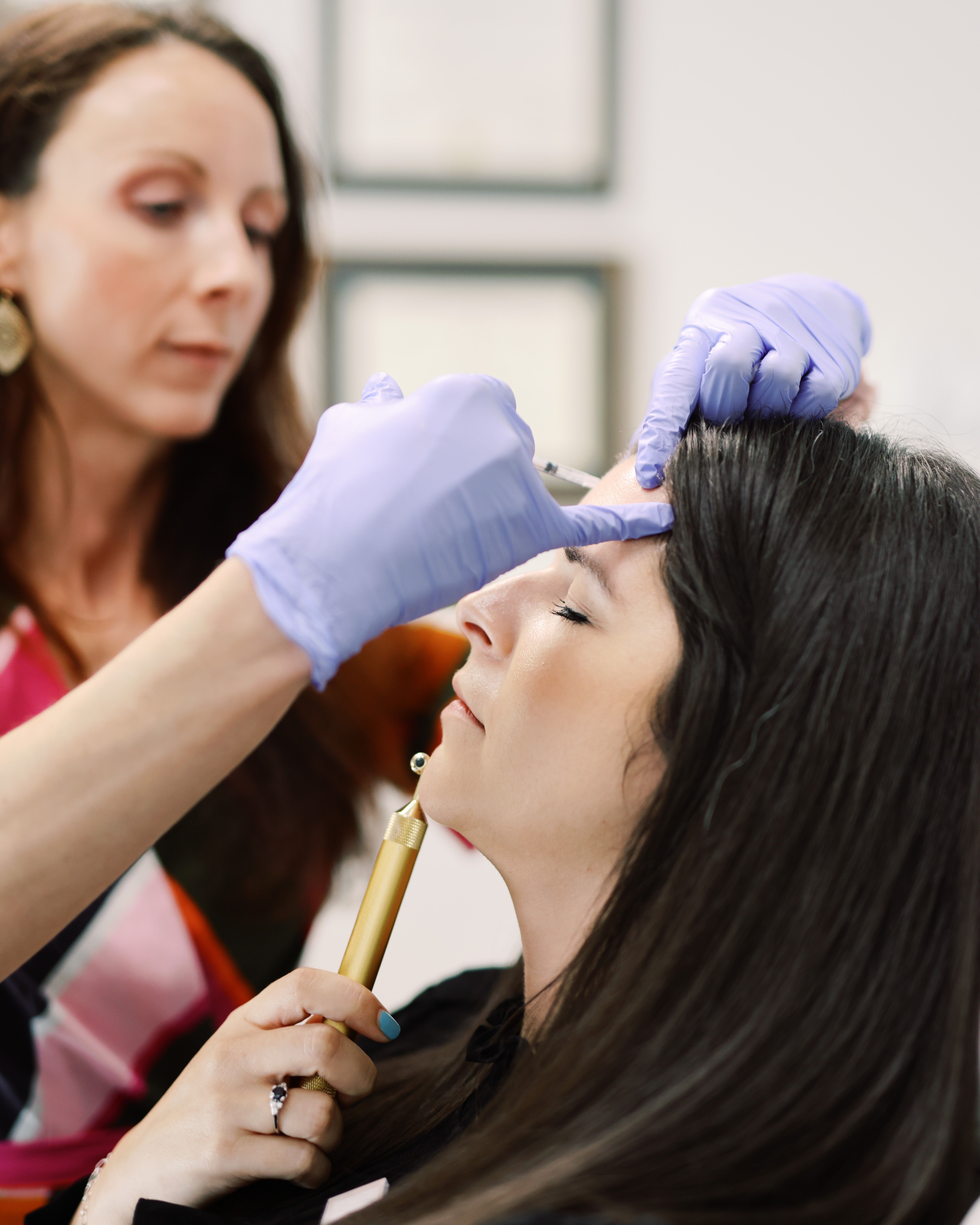 Provider performing a precision injection treatment